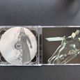 Inside of the CD album box showing the CD2