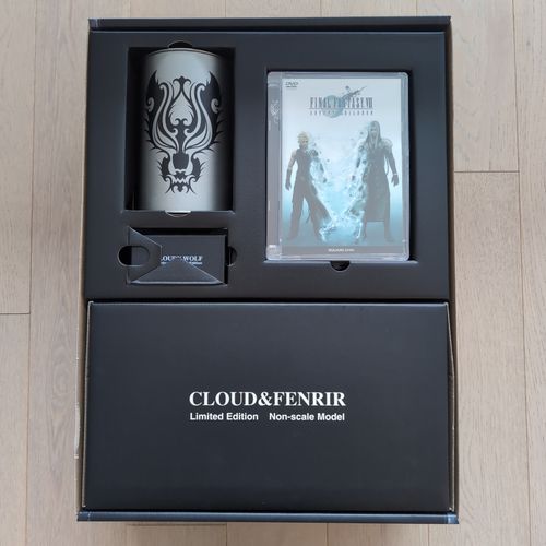 A cup, the DVD, a Cloud figure and a jewel