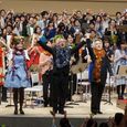 Nobuo Uematsu and Hiroyasu Matsumoto saluting the public