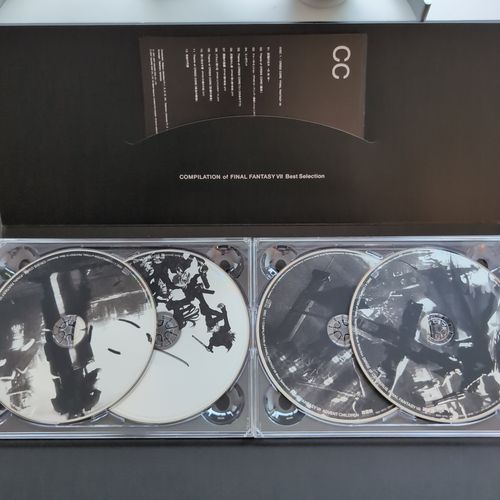 Inside of the CD album box showing the four CDs