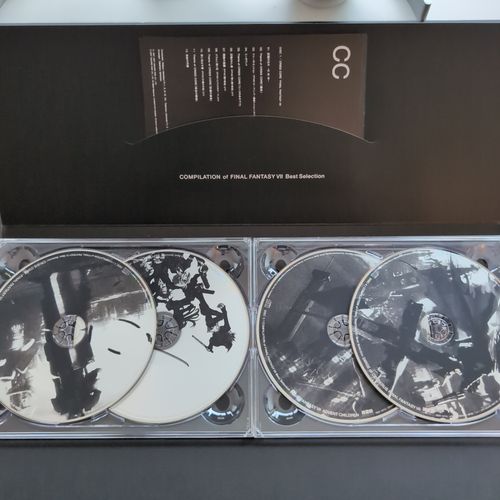 Inside of the CD album box showing the four CDs