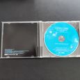 Inside of the CD album box showing the CD