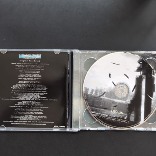 Inside of the CD album box showing the CD1