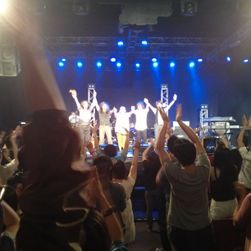 Earthbound Papas band members saluting the public