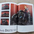 Two open pages from the inside of the book showing Cloud on his Hardy-Daytona.