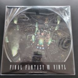 Front cover of the vinyl album box and vinyl side A