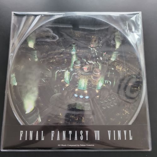 Front cover of the vinyl album box and vinyl side A