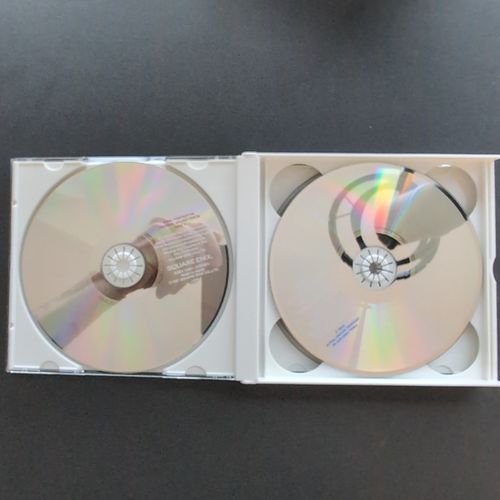 Inside of the CD album box showing two CDs