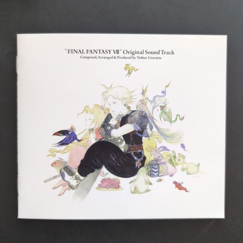 Album booklet with Yoshitaka Amano illustration