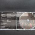 Inside of the CD album box showing the CD