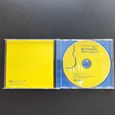 Inside of the CD album box showing the CD