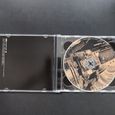 Inside of the CD album box showing the CD1