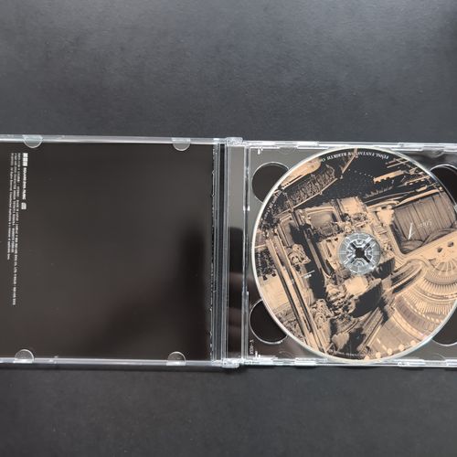 Inside of the CD album box showing the CD1