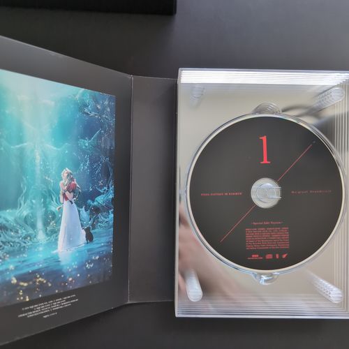 Inside of the CD album box showing one CD