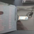 Inside of the CD album box showing a special CD