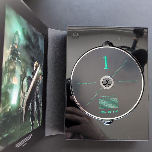 Inside of the CD album box showing one CD