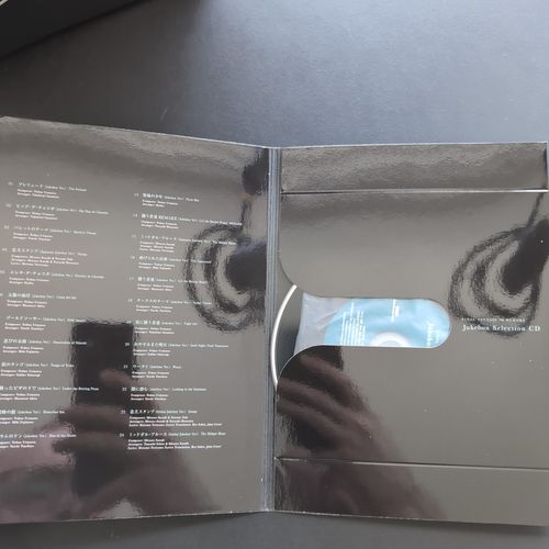 Inside of the CD album box showing a special CD