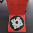 Inside of the CD album box showing the CD