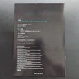Back cover of the book with some text.