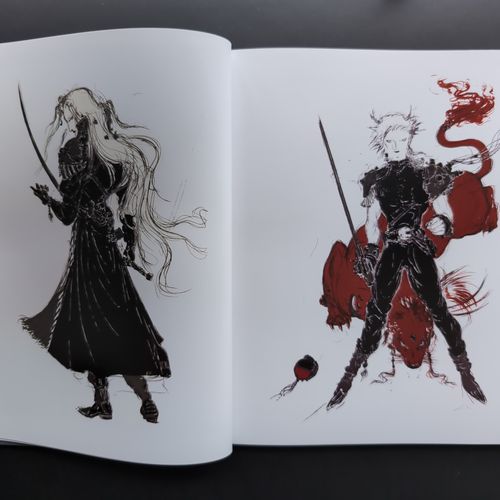 Two open pages from the inside of the third book featuring an illustration of Cloud and Sephiroth.